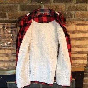 Brand new never worn Ladies hooded vest. Size xl